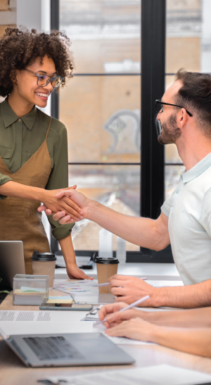 Image of two people shaking hands